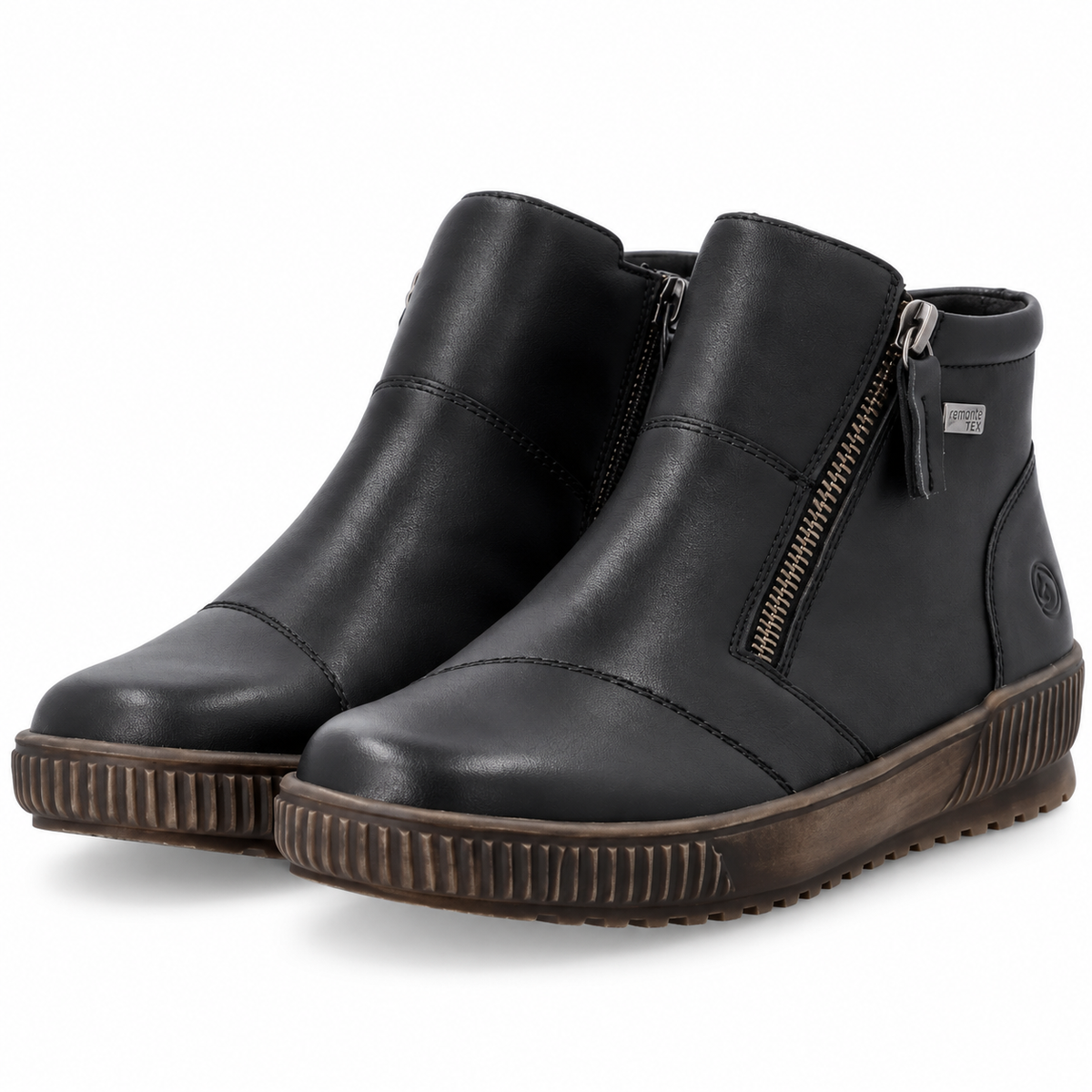A pair of black leather ankle boots with side zippers, featuring a brown ribbed sole, shown on a white background.