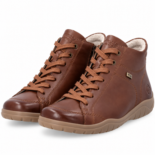 A pair of brown leather lace-up ankle boots with tan soles and a light beige fleece lining, shown on a white background.