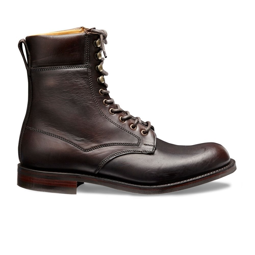 Brown leather boot with laces on a white background